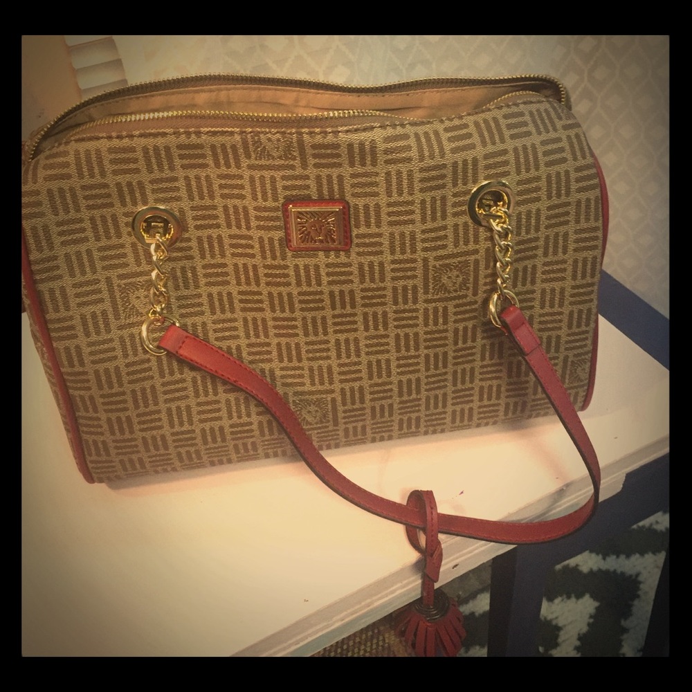 Anne Klein lion logo satchel